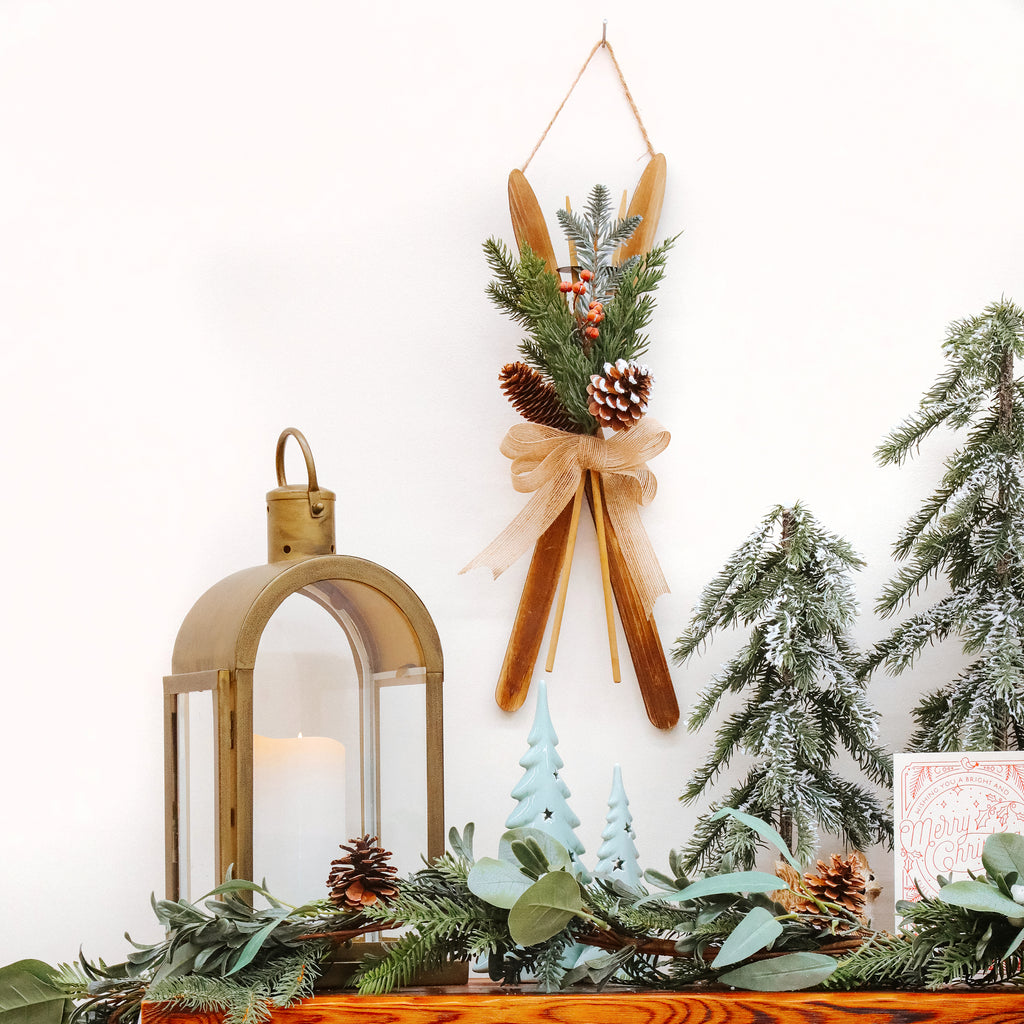 National Tree Company Christmas Wall Decoration, Brown, Wooden, Holiday Skis, Red Berries, Evergreen Tips, Pine Cones with Linen Bow, 17 Inch