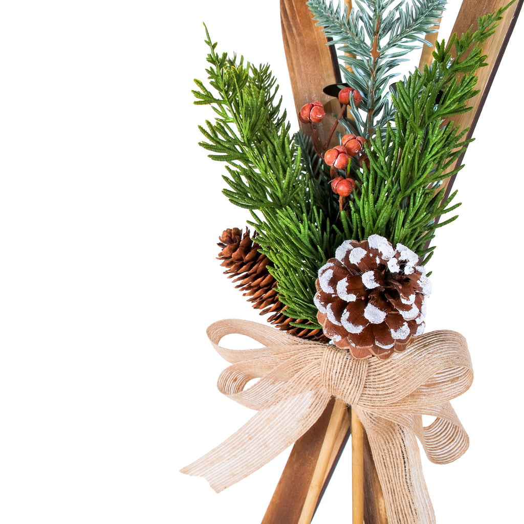 National Tree Company Christmas Wall Decoration, Brown, Wooden, Holiday Skis, Red Berries, Evergreen Tips, Pine Cones with Linen Bow, 17 Inch